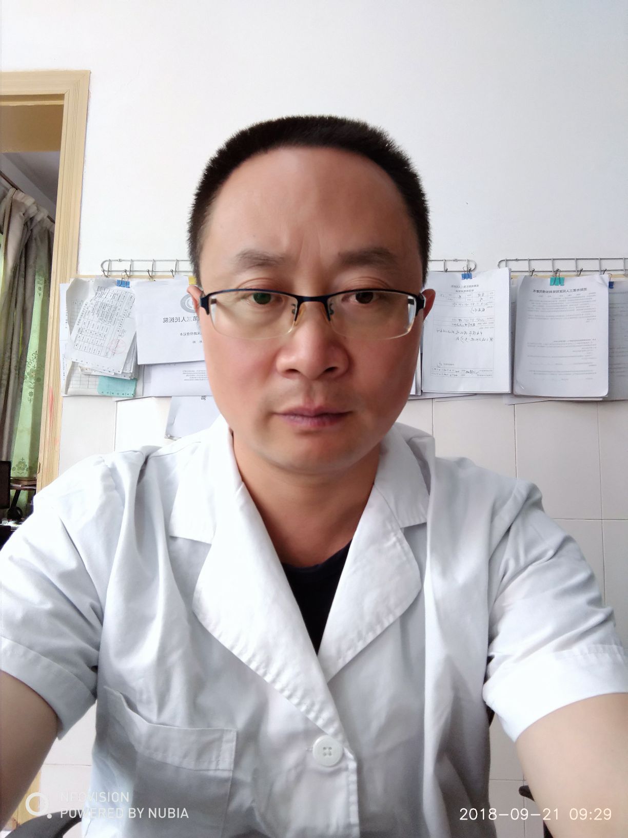 汪在春头像
